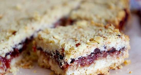 Chocolate and strawberry bars with oatmeal and almonds