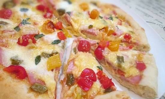 Pizza with baked peppers and ham