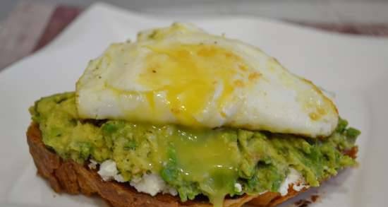 Toast with cheese, avocado and poached egg "Dedication to Natalia"