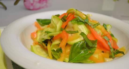 Raw zucchini salad with bell peppers and basil