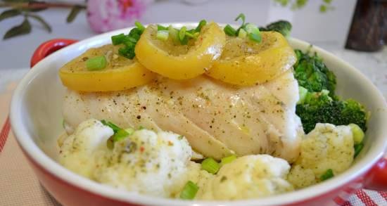Steamed cod on an apple cushion under frozen lemons