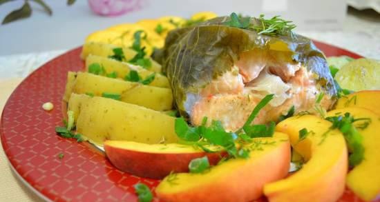 Steamed trout and salmon in horseradish leaves