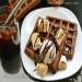 Chocolate waffles with nuts and sauce