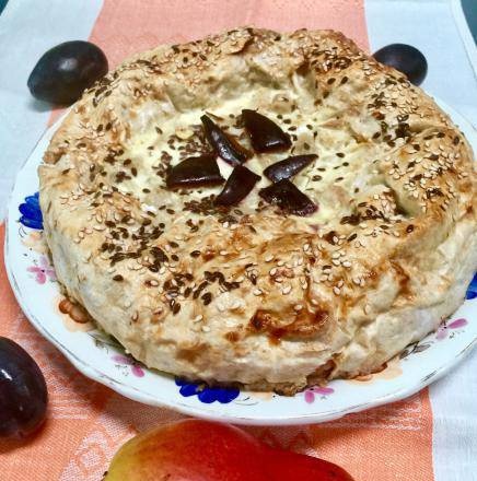 Lavash pie with cottage cheese, pears and plums