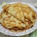 Gluten-free pancakes stuffed with stewed cabbage