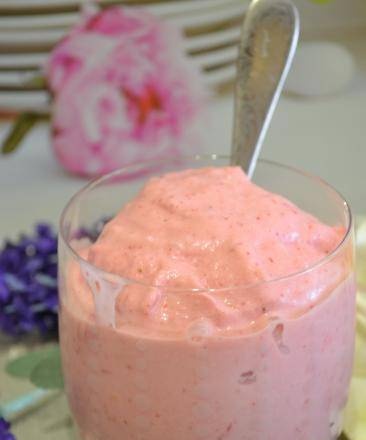 Soft melon ice cream with strawberries and coconut cream