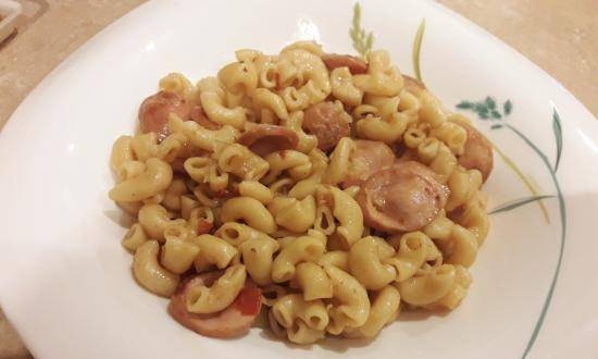 Macaroni with sausages in a multicooker Cuckoo 1004f
