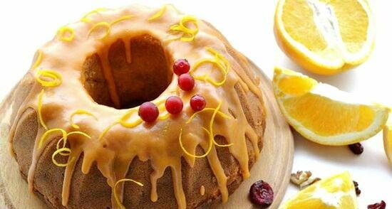 Orange muffin with olive oil, dried cranberries and nuts