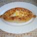 Khachapuri boats with curd and cheese filling