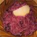 Red cabbage stewed with apple and beets in a slow cooker