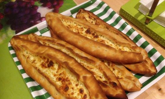 Turkish cakes with fillings (Pide)