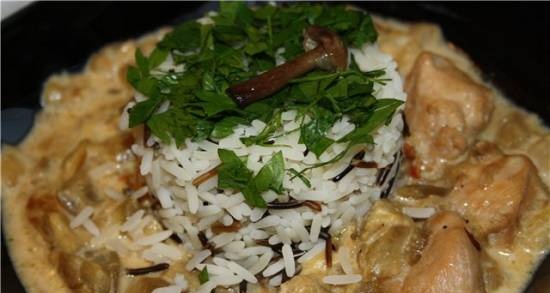 Chicken stewed with eggplant in cheese and sour cream sauce