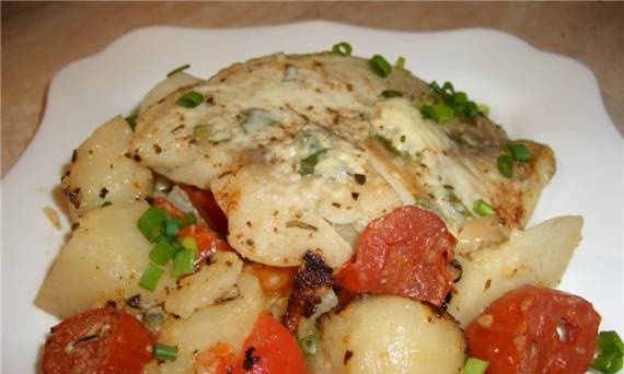 Baked fish with vegetables and cheese