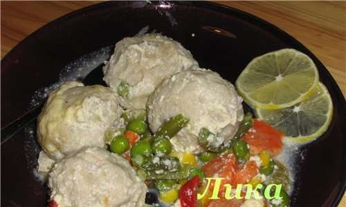 Fish meatballs with vegetables in a slow cooker