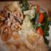 Mariscos con verduras y salsa a baño maría