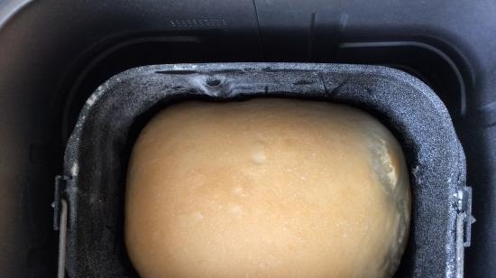 Perché la parte superiore del pane all'inizio era piatta e liscia, e poi si è raggrinzita?