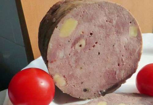 لحم الخنزير مع الفطر والجبن في صانع لحم الخنزير Tescoma