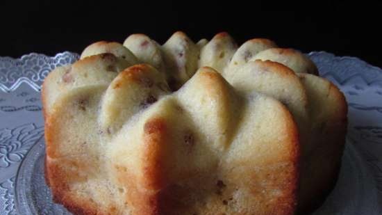 Muffin de manzana bajo una tapa de cuajada