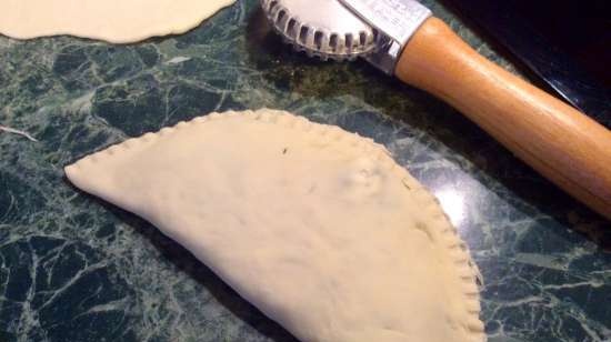 Kutaby met kruiden en ingelegde kaas (Princess pizza maker)
