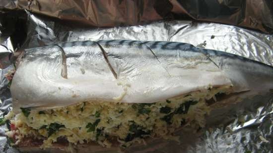 Baked mackerel stuffed with cheese and eggs