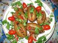 Baked potatoes stuffed with mushrooms and peppers