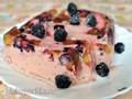 Plum and blackberry ice cream with pieces of berries