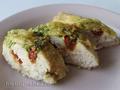 Chicken breasts with sun-dried tomatoes and pesto sauce