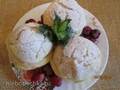 Shu cakes with custard and berry cream