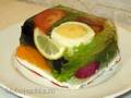 Jellied vegetables on a cheese-garlic pillow