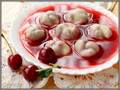 Sweet cherry soup with ravioli