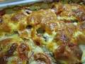 Chicken baked with vegetables, mushrooms and cheese