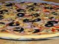 Pizza Eternal classic with ham and mushrooms