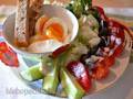 Soft-boiled eggs, salad vegetables with kefir-cheese dressing