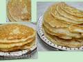 Milk pancakes, butter, on dough from old multigrain dough