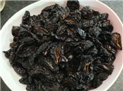 Dried prunes in the oven, in fragrant oil