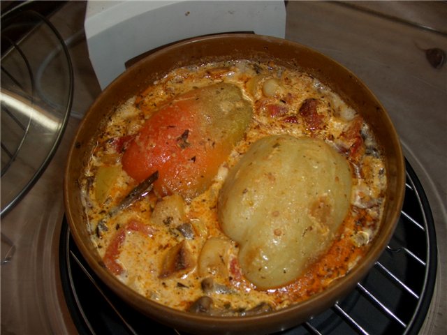 pepper stuffed with meat, vegetables, with creamy sauce in AEROGRILL