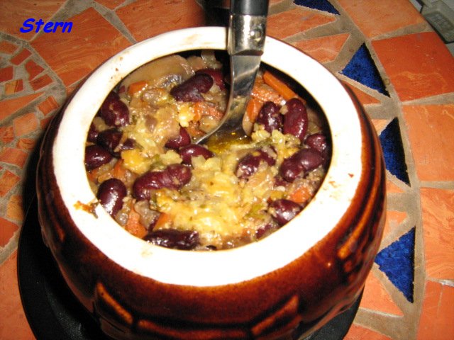 Mushrooms with beans in a pot