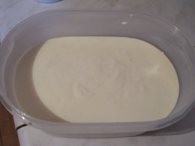 Homemade processed cheese in a milk cooker