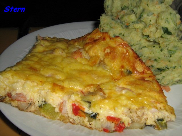 Gebakken omelet met vis en garnalen