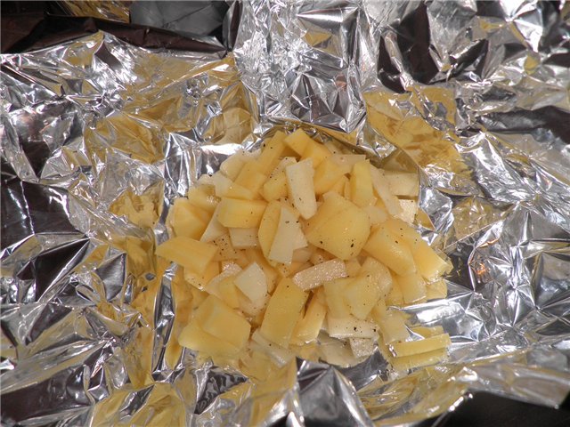 Chicken fillet with cherry and cheese, baked in foil