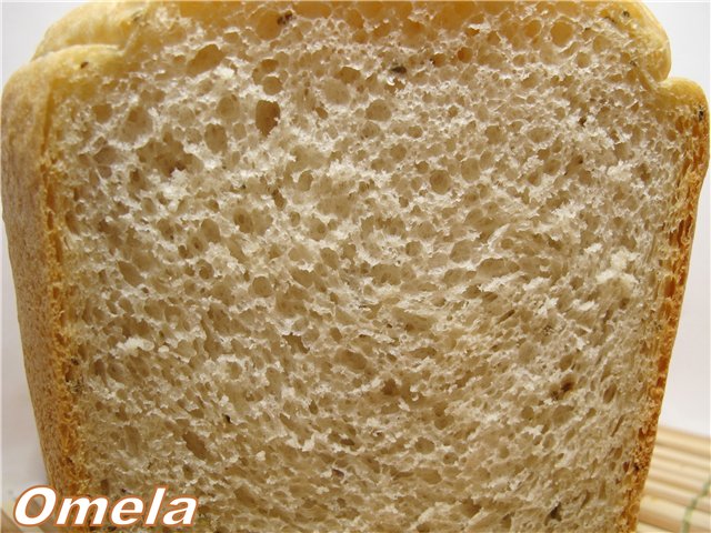 Pan de trigo con anís sobre una masa en una máquina de pan