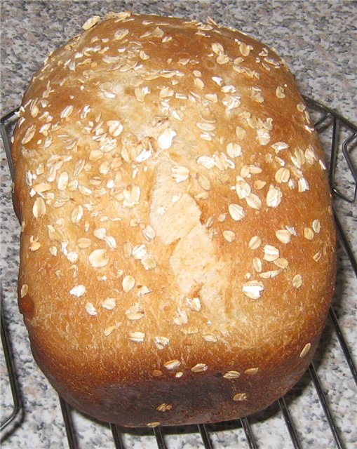 خبز القمح الأبيض المخمر ، حامض متوسط ​​من قبل المسؤول في صانع الخبز