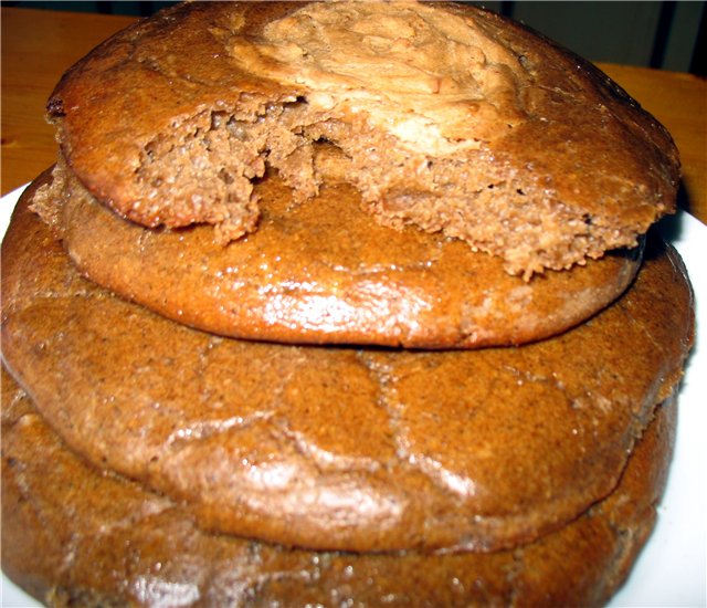 Kolobok (gingerbread man) in the oven
