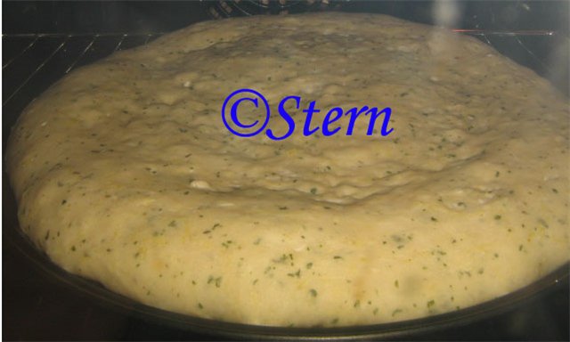 Bread on raw potatoes with herbs (oven)