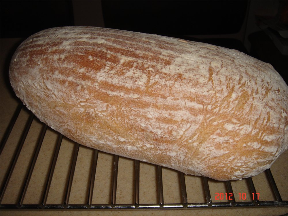 Rustic wheat bread (Pane Bigio) in the oven