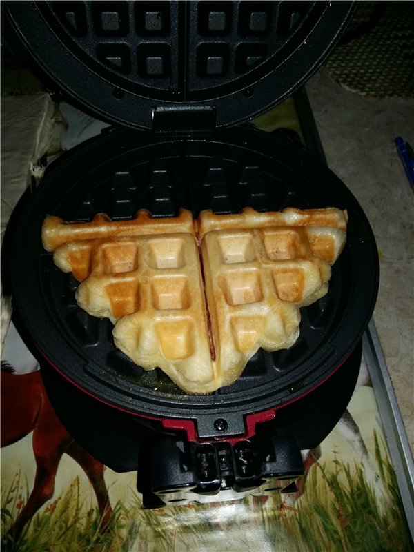 Puff pastry waffles in a waffle iron