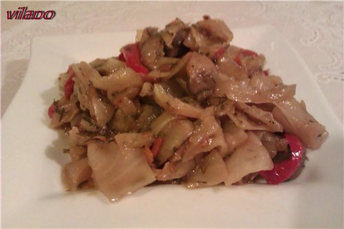 Spicy cabbage with mushrooms and tomatoes