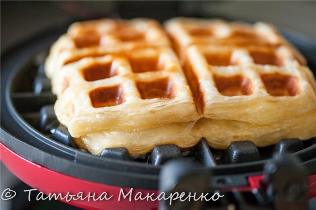 Puff pastry waffles in a waffle iron