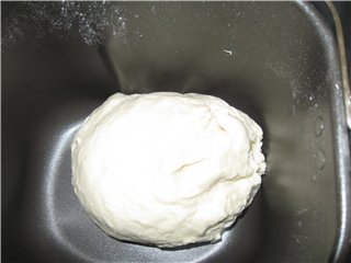 Bork. Kaasbrood in een broodbakmachine