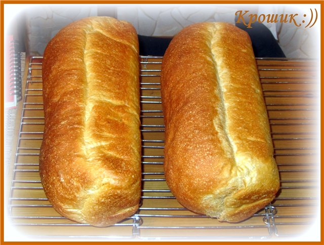 Molded milk bread from flour of the 1st grade (in the oven)
